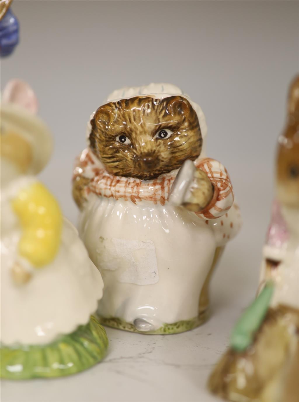 Seven Beswick Beatrix potter characters and five other ceramic models